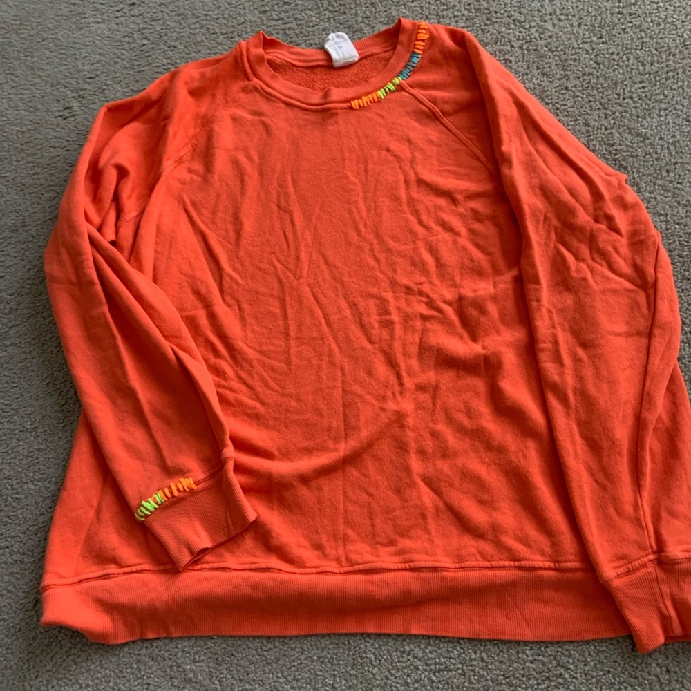 I stole my boyfriend’s sweatshirt orange with stitching